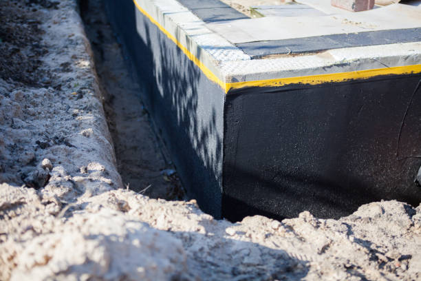 Professional Interior Drainage System technician working in Montezuma, GA